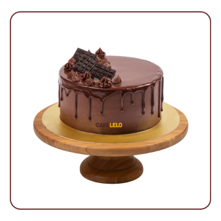 Chocolate Nutella Cake with glossy hazelnut spread drip and roasted nut crunch on a rich chocolate sponge.