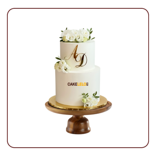 Love Knot themed engagement cake with intertwined fondant design, available at bakery in Kudasan Gandhinagar for ring ceremony.