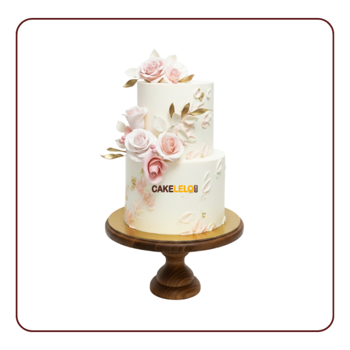 The Perfect Pair Cake – a beautiful two-tier wedding cake with complementary designs symbolizing a couple in Kudasan.