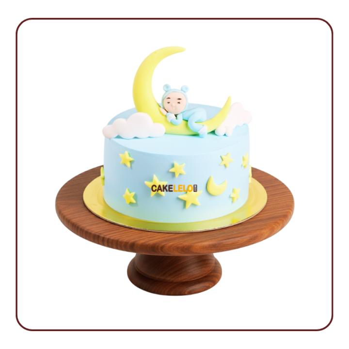 baby shower in Kudasan, light blue frosting with fondant sleeping baby on gold moon topper, edible yellow stars.
