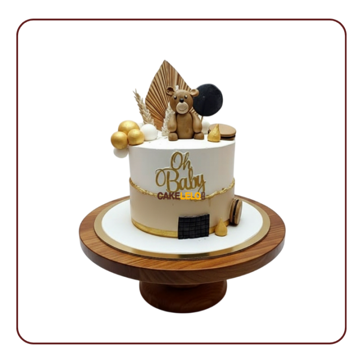 White gold icing, cute fondant teddy bear, and decorative gold palm leaf topper - Best bakery Kudasan Gandhinagar
