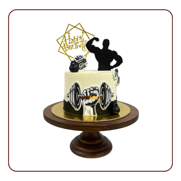 Custom Gym Warrior Cake, featuring a black bodybuilder, fondant kettlebells, and dumbbell cutouts on a white base.