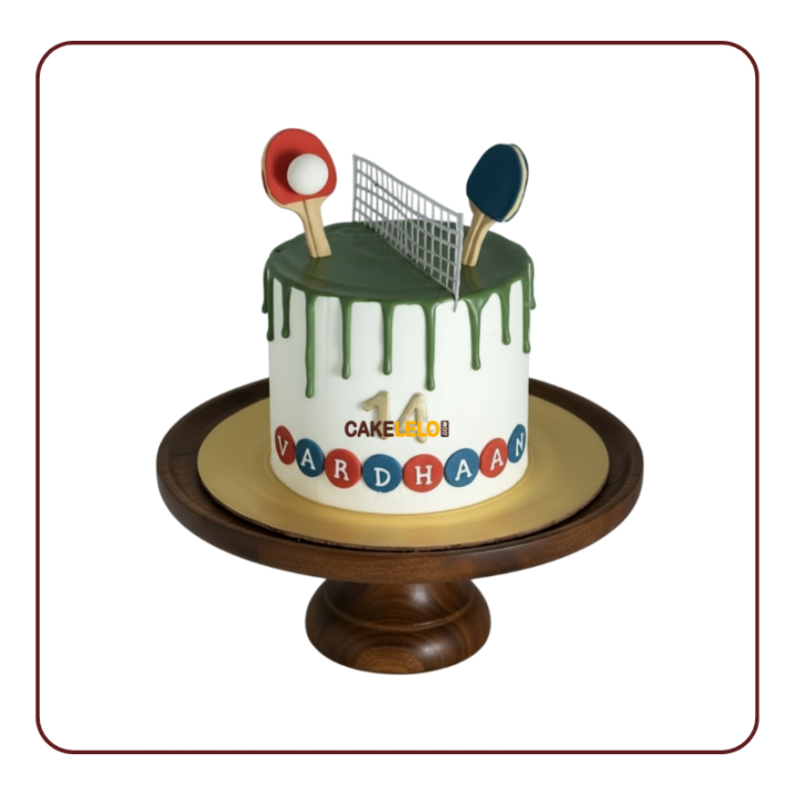 green drip icing, 3D fondant ping pong paddles and ball, net topper, and personalized name "Vardhaan".