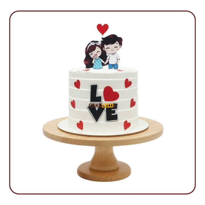 A couple with decorative icing border for anniversary in Kudasan Gandhinagar.
